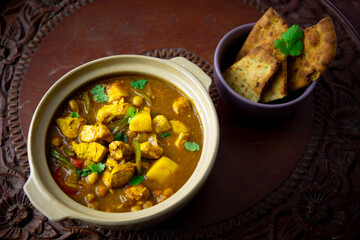 Homemade Mango Coconut Curry Chicken with White Rice and Garlic Naan Flatbread
