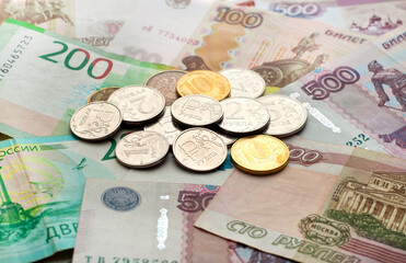 Money of Russia. Banknotes and coins. Close-up of Russian rubles of various denominations. Finance concept.