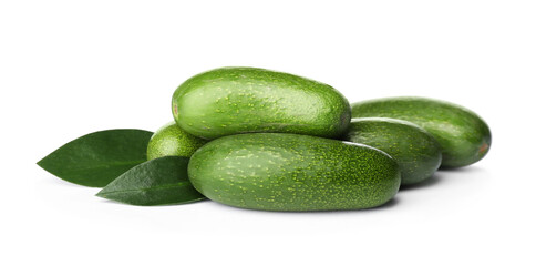 Fresh whole seedless avocados with leaves isolated on white