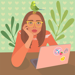Girl with laptop and parrot