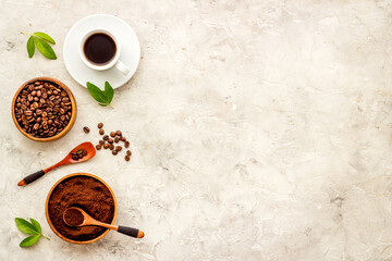 Coffee background. Coffee beans and hot drink, top view