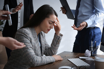 Businesswoman stressing out at workplace in office