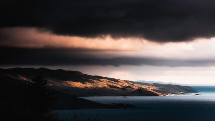 Dramatic sky over Loch Alsh on the west coast of Scotland.Beautiful landscape scenery on diverse Scottish coastline captured during extreme lighting conditions.