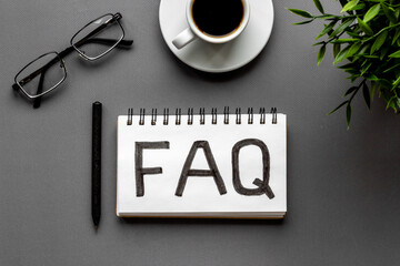 FAQ concept. Text on office table. Information Helpdesk