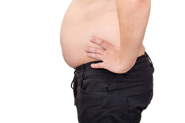 A man with a big belly in black pants on a white background, isolate. Obesity and malnutrition concept, close-up