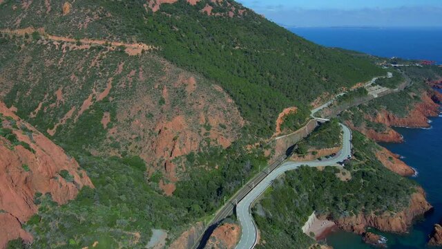 Aerial shots of the red mountains of the Massif de L'essterel in France..