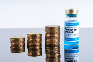 Medical concept ampoules or vials with Covid-19 vaccine on a laboratory bench