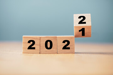 Flipping of wooden cube block for change 2021 to 2022 year , Preparation for merry Christmas and...