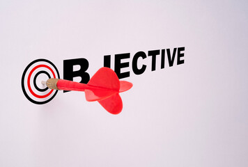 Red dart arrow hit on target board and white background, Business Achievement objective target concept.