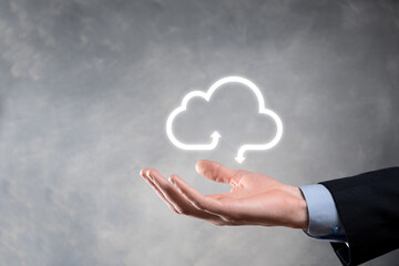 Businessman hold cloud icon.Cloud computing concept - connect smart phone to cloud. computing network information technologist with smart phone.Big data Concept.