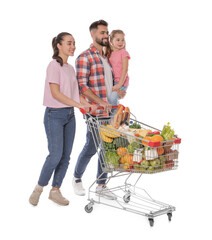 Happy family with shopping cart full of groceries on white background © New Africa