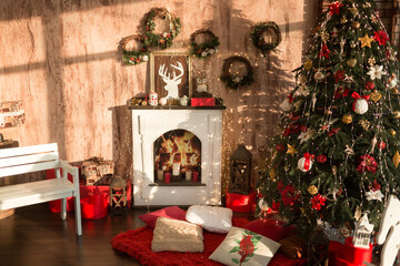 New Year's interior with an elegant Christmas tree and a fireplace.