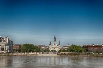 View of Saint Louis Cathedral from across the Mississippi River in New Orleans, Louisiana, USA