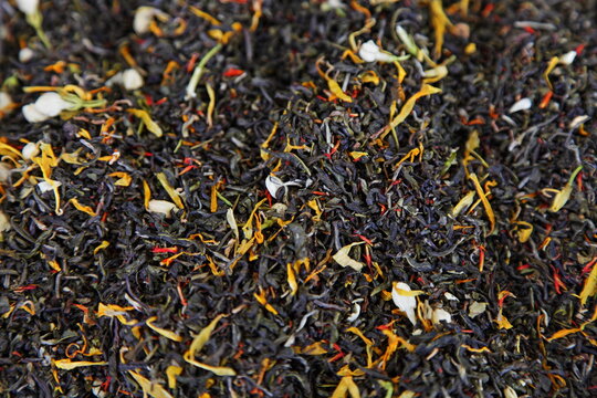 Dried black gray fruit tea mix background texture, natural ingredient for food cooking