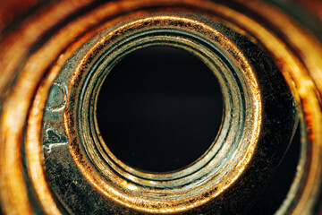 Metal nut on black background close up