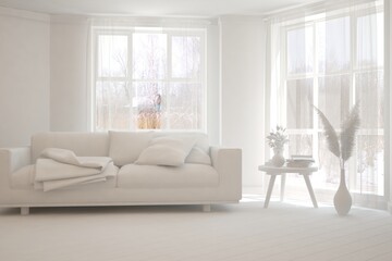Mock up of stylish room in white color with sofa and winter landscape in window. Scandinavian interior design. 3D illustration