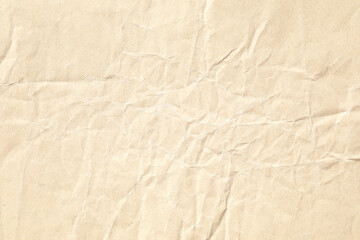 Crumpled brown background paper sheet texture