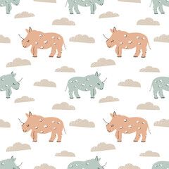 Cute funny seamless vector pattern with rhinos and clouds. Infantile style nursery Art with pink and blue rhinoceros ideal for Fabric, Textile. Hand drawn modern illustration in nice colors.