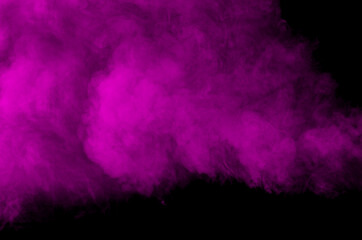 Magenta smoke on black background