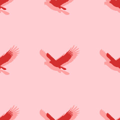 Seamless pattern of large isolated red eagle symbols. The elements are evenly spaced. Vector illustration on light red background