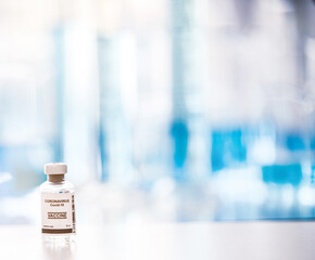 coronavirus covid-19 vaccine bottle background ,vaccination concept .