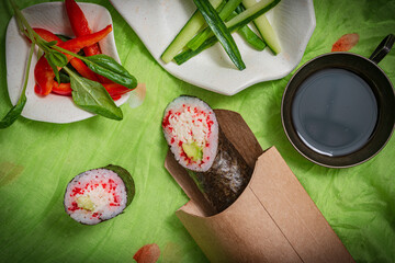 Still life. Japanese cuisine- roll in a package