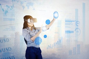 Businesswoman touches diagram on virtual screen