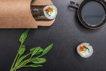 Still life. Japanese cuisine- roll in a package