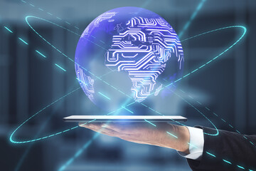 Global network connection and big data concept with earth planet and world map scheme above man hand with digital tablet