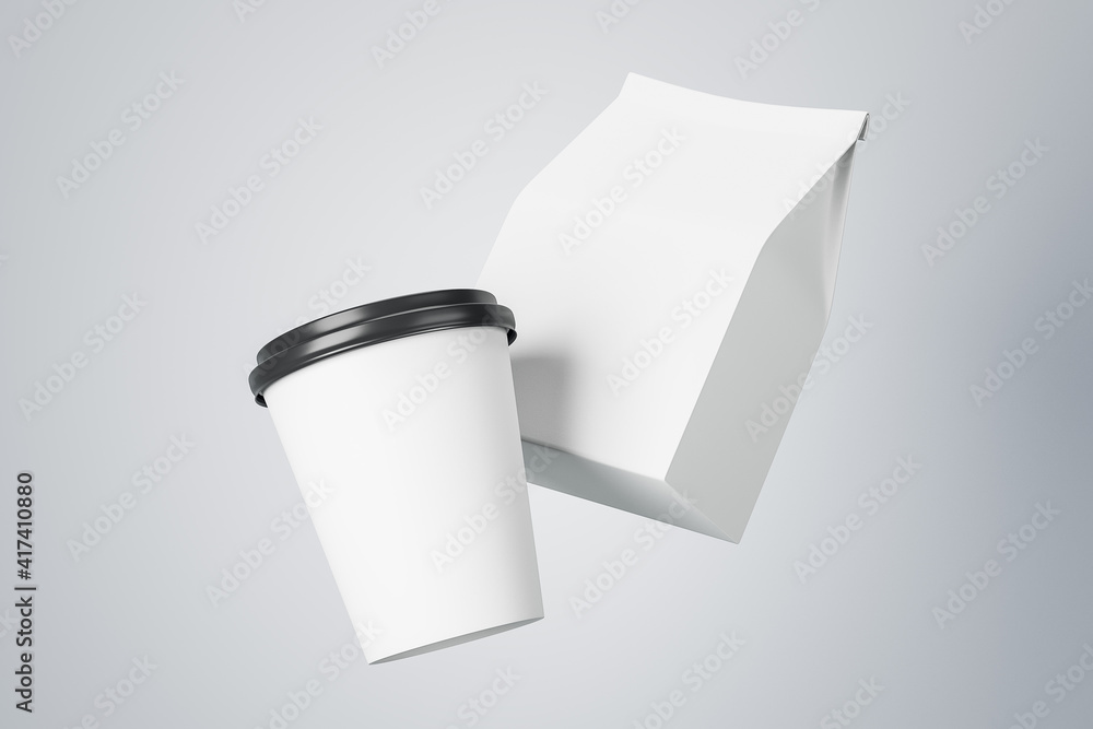 Poster white paper cup to go and white paper package with copyspace for your logo at abstract light backgro