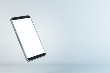 Blank white smartphone screen at light background. Mock up