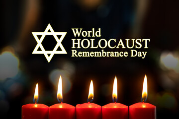 Candles with world holocaust remembrance day text