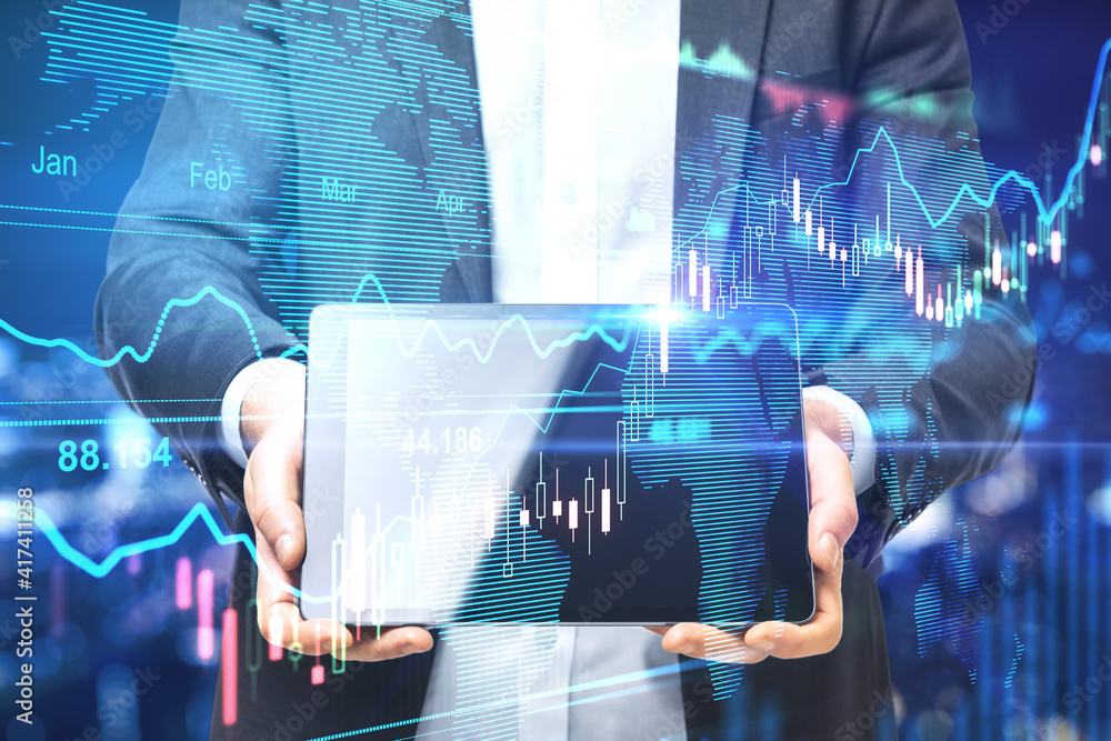 Aufkleber stock market concept with businessman showing digital tablet display and digital forex chart baord w