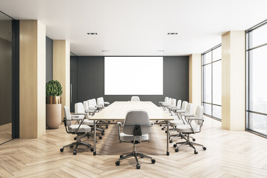 Blank white screen on dark wall in eco style conference room with modern furniture and parquet floor. 3D rendering, mock up