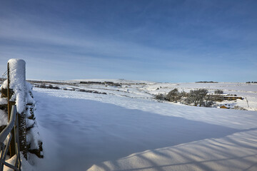 With a snow covered farm gate, the hamlet of Moorhouses rests under a blanket of snow at 900ft