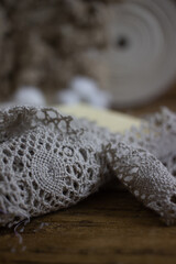 Obraz premium white lace on wooden background