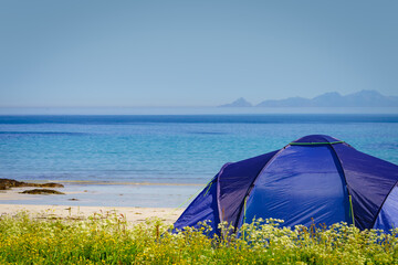 Seascape with tent on beach, Lofoten Norway