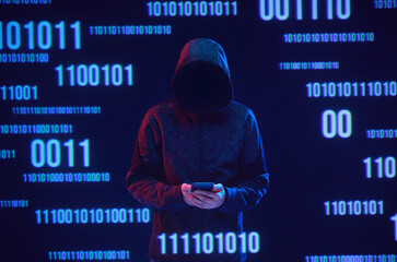 Dangerous hacker. Internet, cyber crime, cyber attack, system, game, breaking and malware concept. Dark background. Futuristic holographic interface to display data.