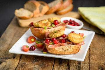 sandwich with fried camembert cheese and bacon