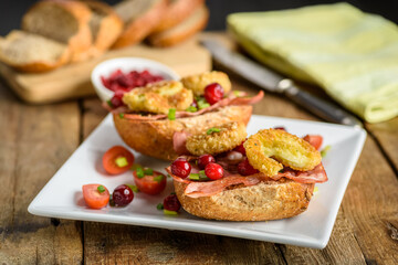 sandwich with fried camembert cheese and bacon