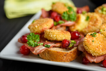 sandwich with fried camembert cheese and bacon