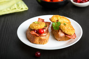 sandwich with fried camembert cheese and bacon