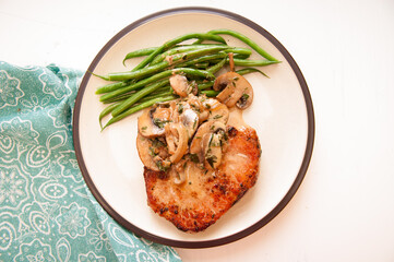 pork chop with green bean feta salad