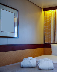 Cozy but dated oceanview cabin or stateroom on classic cruiseship or cruise ship liner with desk,...