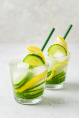 Refreshing lemon cucumber summer iced drinks. Space for text.