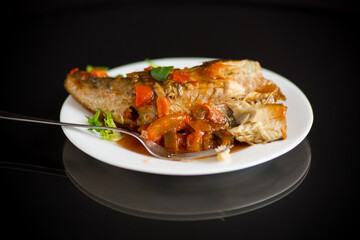 whole fish hake stewed with carrots, beets, peppers and other