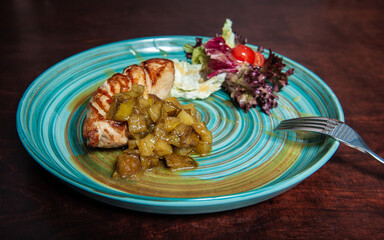 Grilled pork meat with pound cucumber and salad