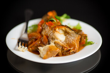 whole fish hake stewed with carrots, beets, peppers and other