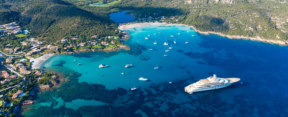 View from above, stunning aerial view of the Grande Pevero beach with boats and luxury yachts...