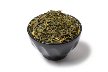 Green tea with jasmine flowers on black background